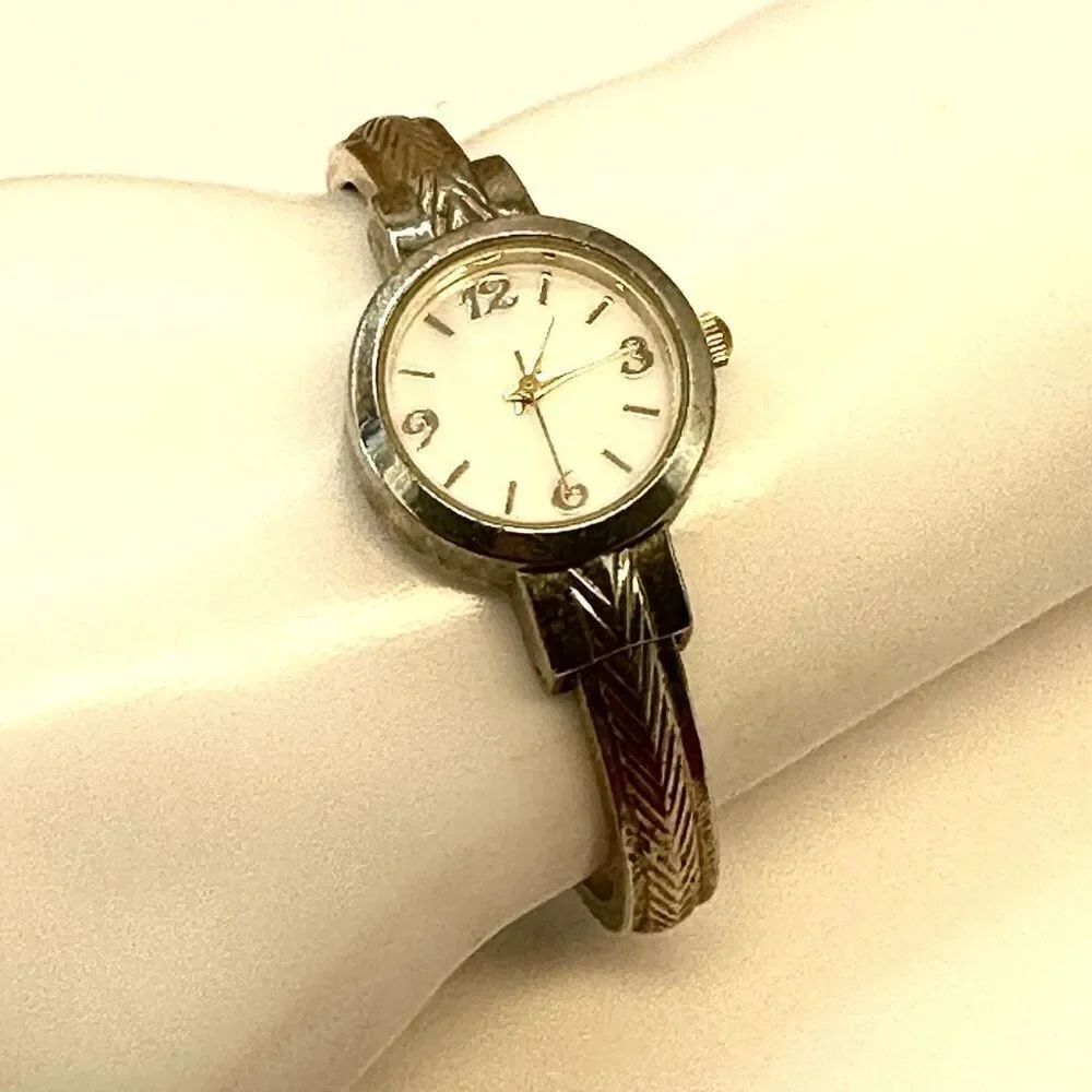 Vintage gold tone bracelet watch abalone face